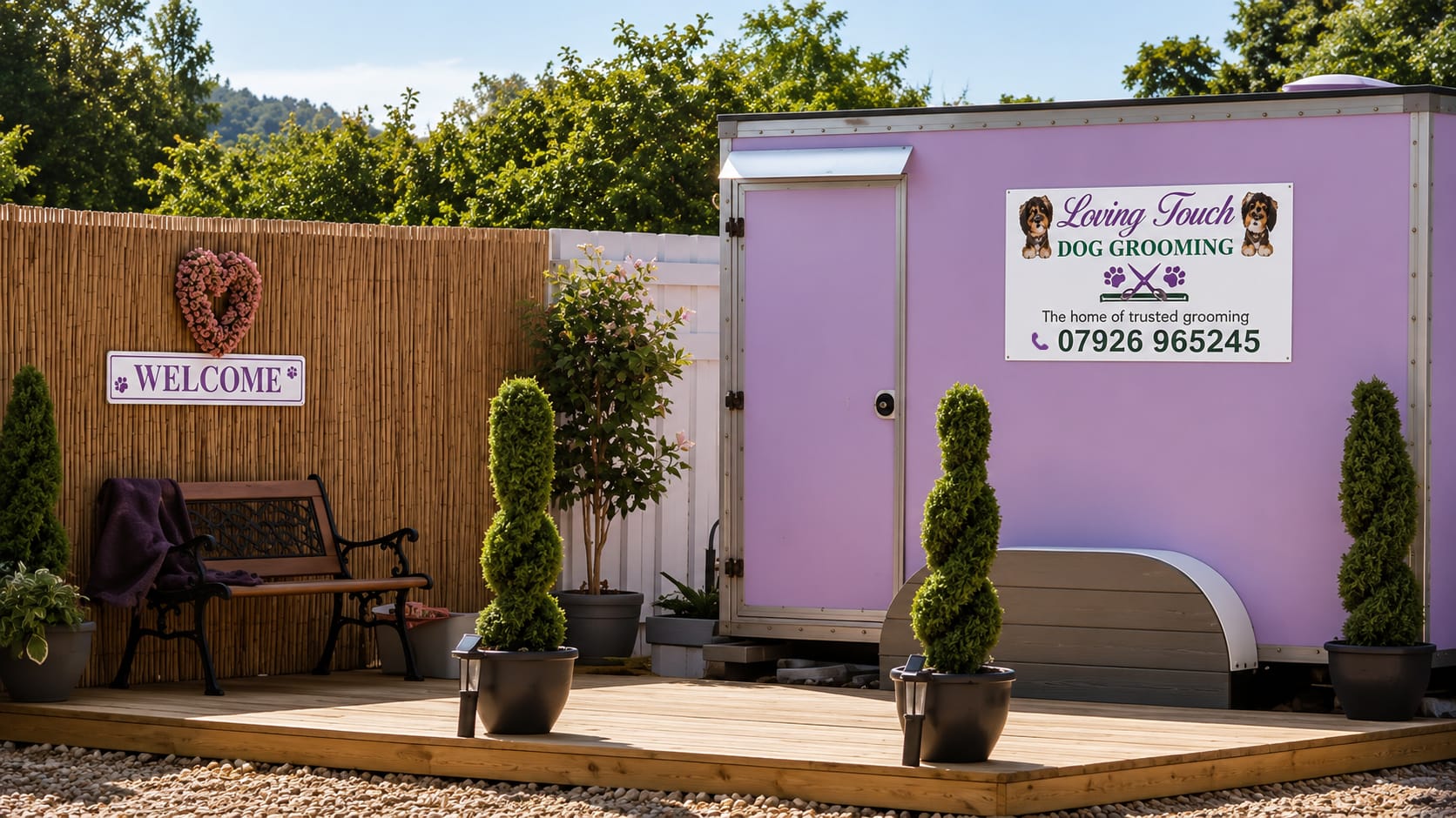 The Loving Touch Dog Grooming studio in South Ockendon: a lilac grooming room with a welcome sign, bench and potted plants